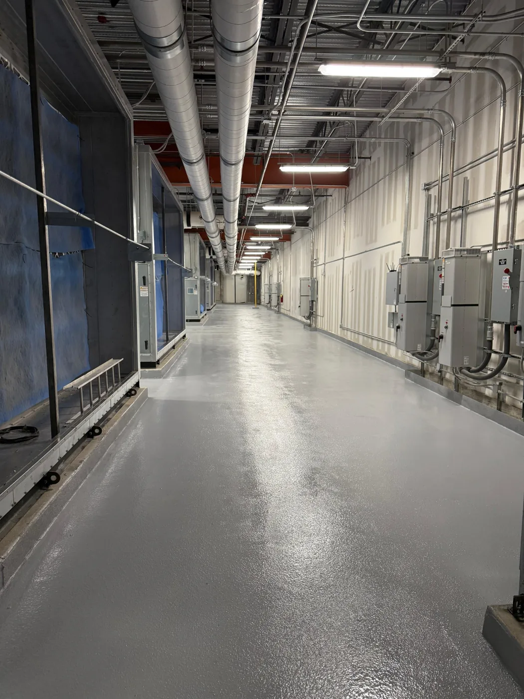 Finished protective floor coating in a commercial mechanical area